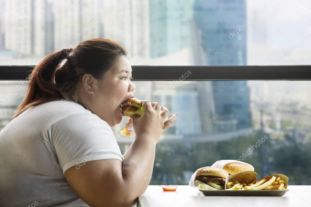 Fat woman caught red handed checking out fridge