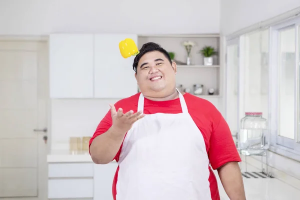 Young fat man looks tired after exercises on studio — Stock Photo, Image