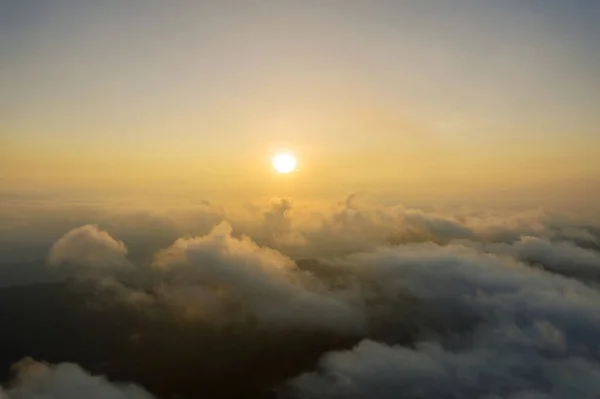 Beautiful scenery of sunrise above clouds — Stock Photo, Image