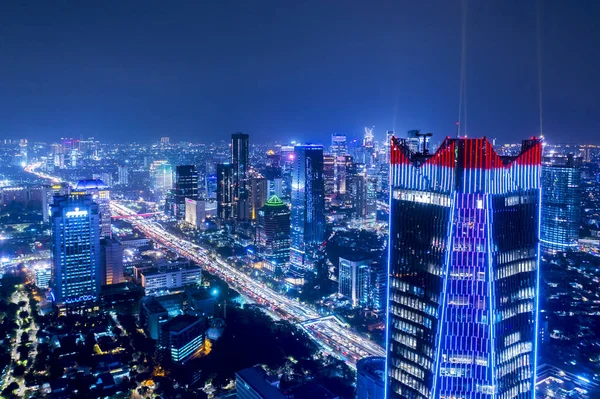 Prachtige Jakarta stad met lichten van wolkenkrabbers — Stockfoto
