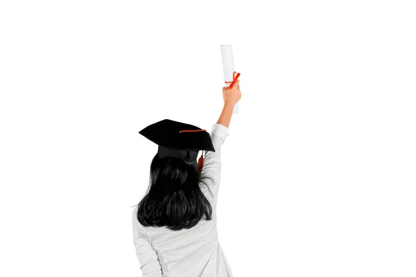 Vista Trasera Una Joven Que Celebra Graduación Levantando Diploma Mientras —  Fotos de Stock