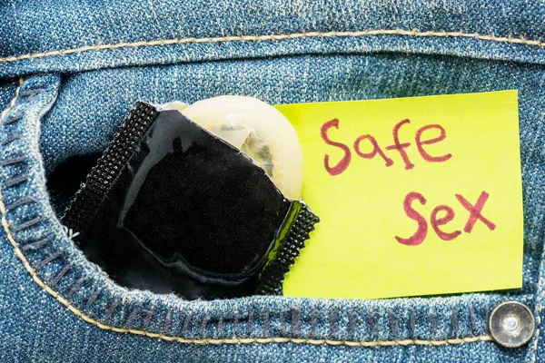 Close Opened Condom Pack Note Safe Sex Text Pocket Jeans — Stock Photo, Image