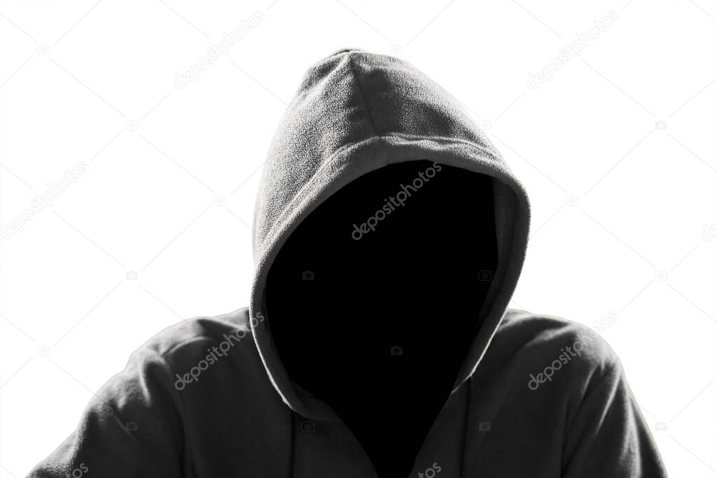 Hooded unknown hacker with dark face isolated on white background