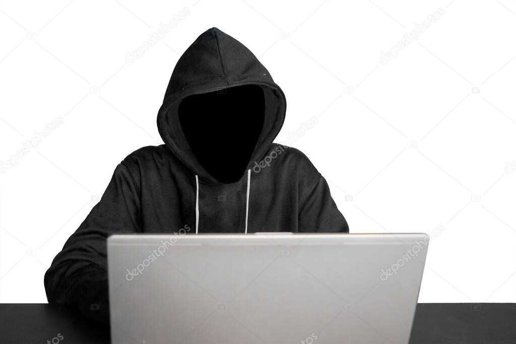 Unknown hacker working with laptop on the table isolated on white background