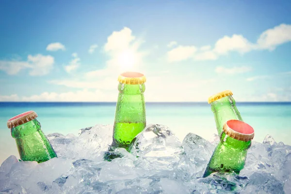 Close Five Frosty Beer Bottles Stack Ice Cubes Blue Sky — Stock Photo, Image