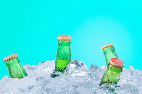 Five Frosty Beer Bottles Stack Ice Cubes Studio Blue Color — Stock Photo, Image