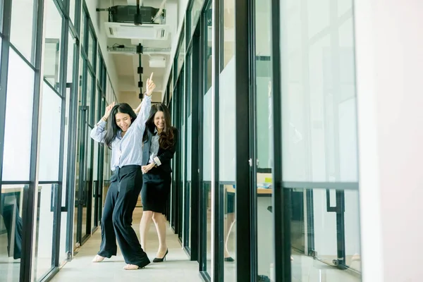 Two Happy Businesswoman Celebrating Success Dancing Office Corridor — Stock Photo, Image