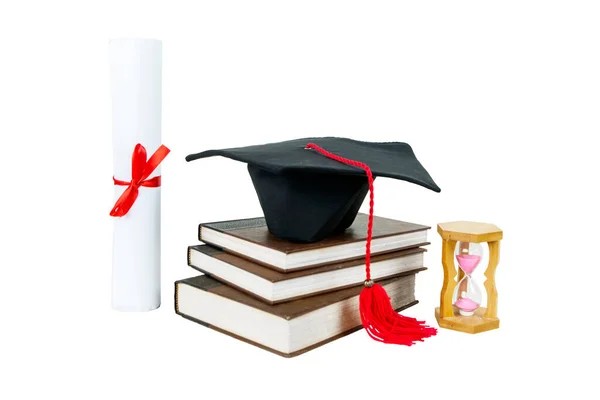 Close Graduation Cap Pile Books Diploma Hourglass Table Isolated White — Stock Photo, Image