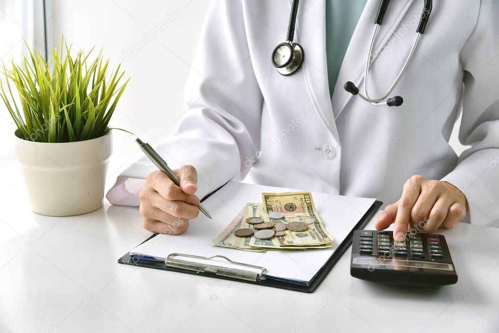 Medical fee, Health insurance, Doctor writing medication note and calculate the examination charges in hospital, Money saving for healthcare services.
