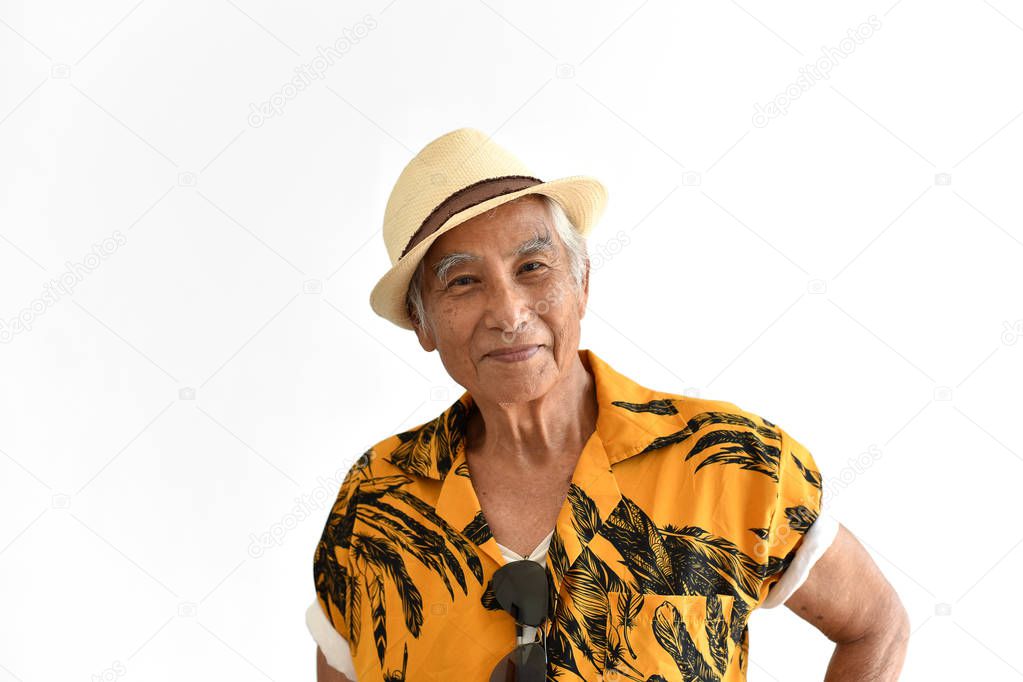 Cheerful asian senior old man, Confident and smiling elderly people in colorful hawaii shirt, Happy retiree citizen and travel concept.
