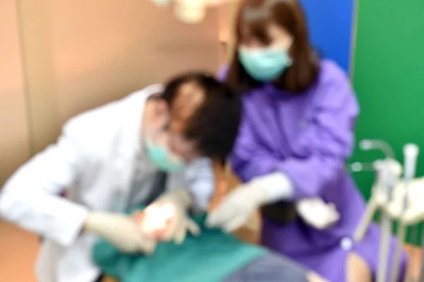 Blurred of Dental care check up, Dentist examining and doing teeth treatment in dental clinic, Yearly visit for teeth cleaning and scaling to prevent gum disease problems, Healthy oral hygienic. — Stock Photo, Image