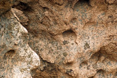 Kaya erozyonu. Yıpranmış. Jeolojik oluşumlar, yakın çekim, doku