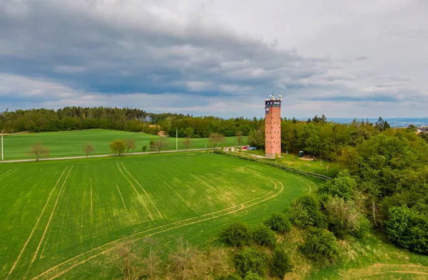 Aerial shot of lookout tower in Hlina village, czech republic. Wooden building has name of \