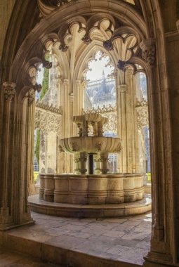 Lavabo. Consists of a fountain and two smaller basins above. Monastery of Batalha or Monastery of Saint Mary of the Victory. Dominican convent. UNESCO World Heritage Site. Batalha, district of Leiria, Estremadura, Portugal clipart