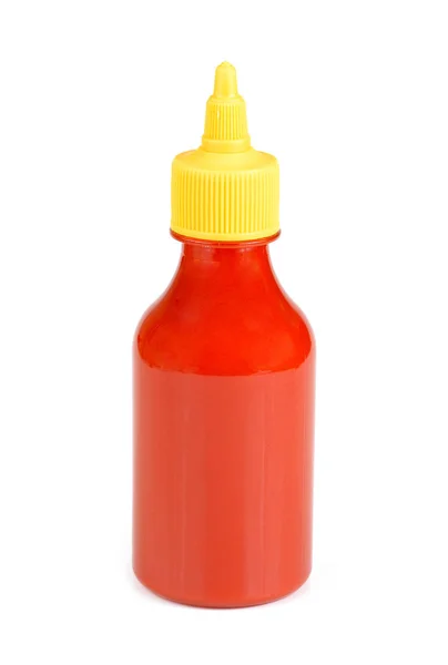 Бутылка томатного кетчупа на белом фоне — стоковое фото