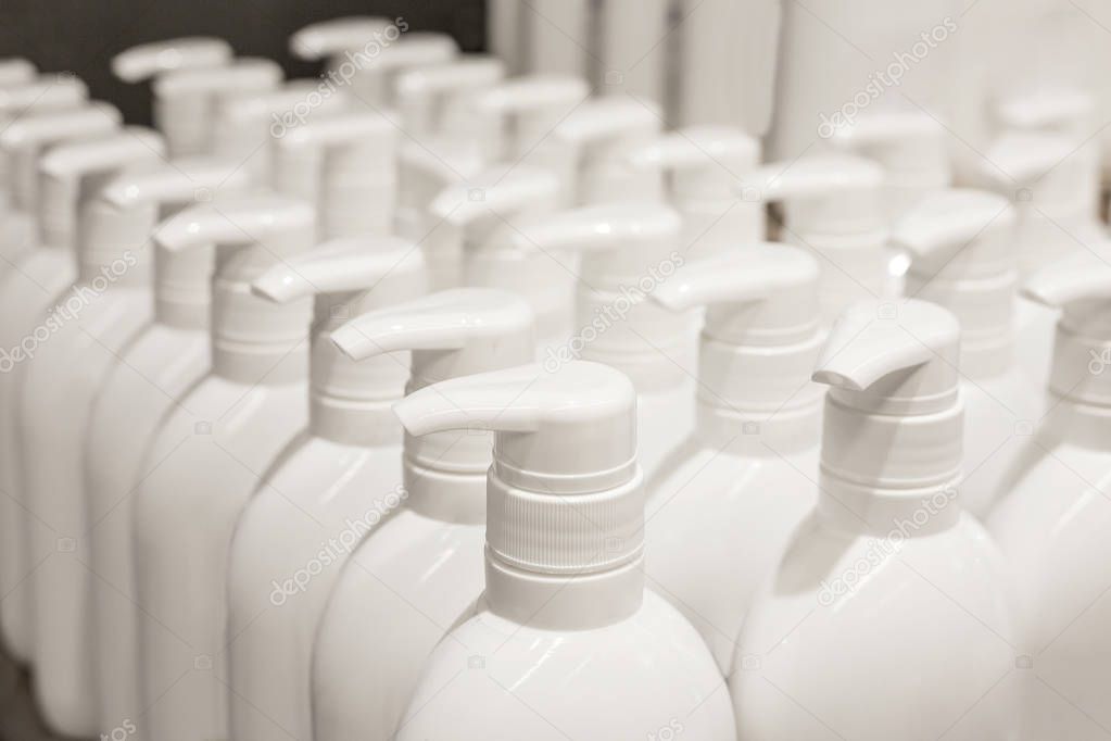 White plastic bottle with antibacterial liquid soap.