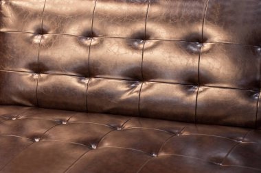 Kahverengi deri kanepe güzel bir fon.