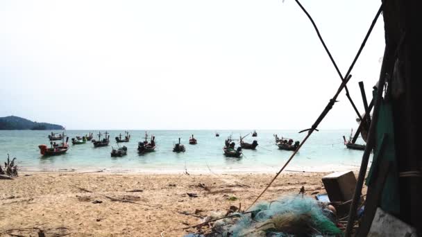 White Nai Yang Beach, fishing boat sea water in the morning,Near the airport tropical at phuket Thailand. — Stock Video