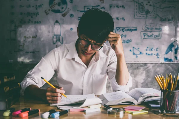 Young Asian Student Man Sitting Desk Home Studying Reading Doing — Stock Photo, Image