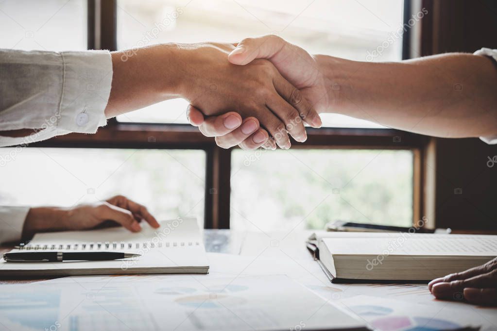 Business shaking hands after discussing good deal of Trading to sign agreement and become a business partner, contract for both companies, Successful businessman handshake.