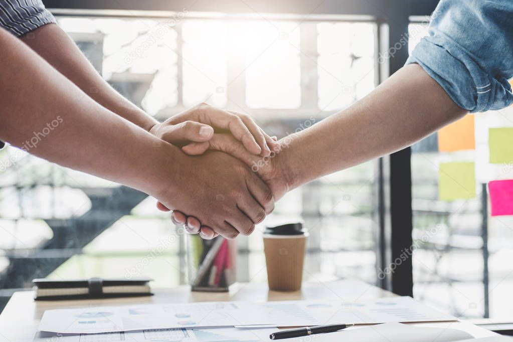 Finishing up a meeting, Business handshake after discussing good deal of Trading contract for both companies and gesturing people connection deal, Meeting and greeting concept.
