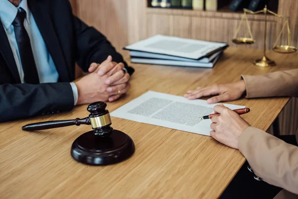 Customer service good cooperation, Consultation between a Businesswoman and Male lawyer or judge consult having team meeting with client, Law and Legal services concept.