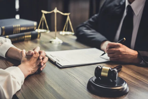 Good service cooperation, Consultation of Businesswoman and Male lawyer or judge counselor having team meeting with client, Law and Legal services concept.