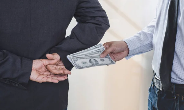 Corruzione e concetto di corruzione, corruzione sotto forma di banconota da un dollaro — Foto Stock