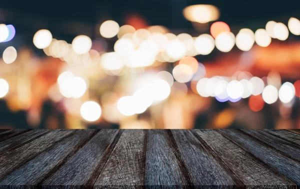 Selective Empty wooden table in front of abstract blurred festiv — Stock Photo, Image