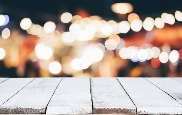 Selective Empty wooden table in front of abstract blurred festiv — Stock Photo, Image