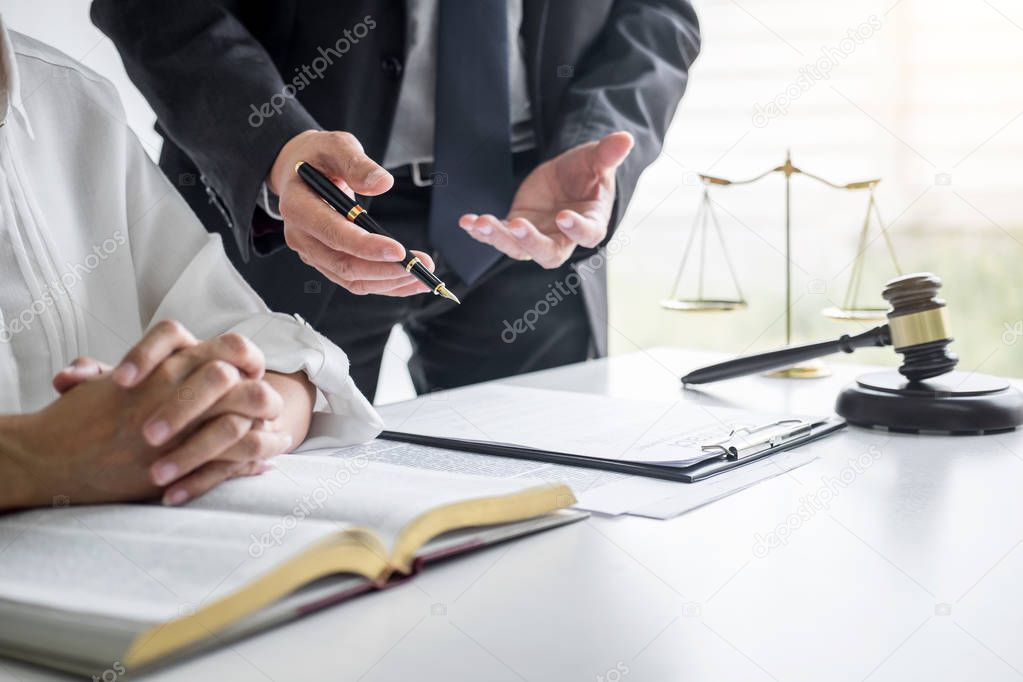 Businesswoman and Male lawyer or judge consult and conference ha