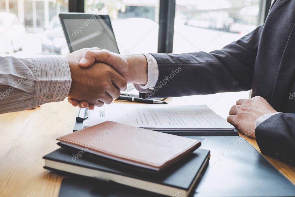 Greeting new colleagues, Handshake while job interviewing, male 