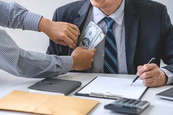 Bribery and corruption concept, bribe in the form of dollar bill — Stock Photo, Image