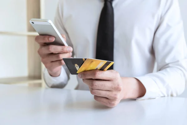 Man using credit card register security code payments online shopping and customer service network connection market, using technology on smartphone, Internet Online shopping or banking concept.