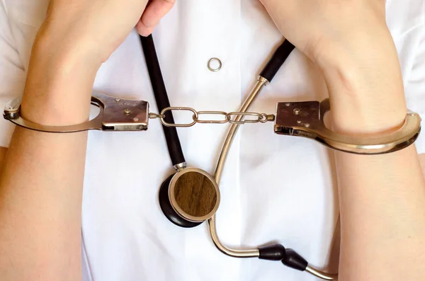 Doctor Stethoscope Hand Handcuffs Close Concept Medical Malpractice Mistake — Stock Photo, Image