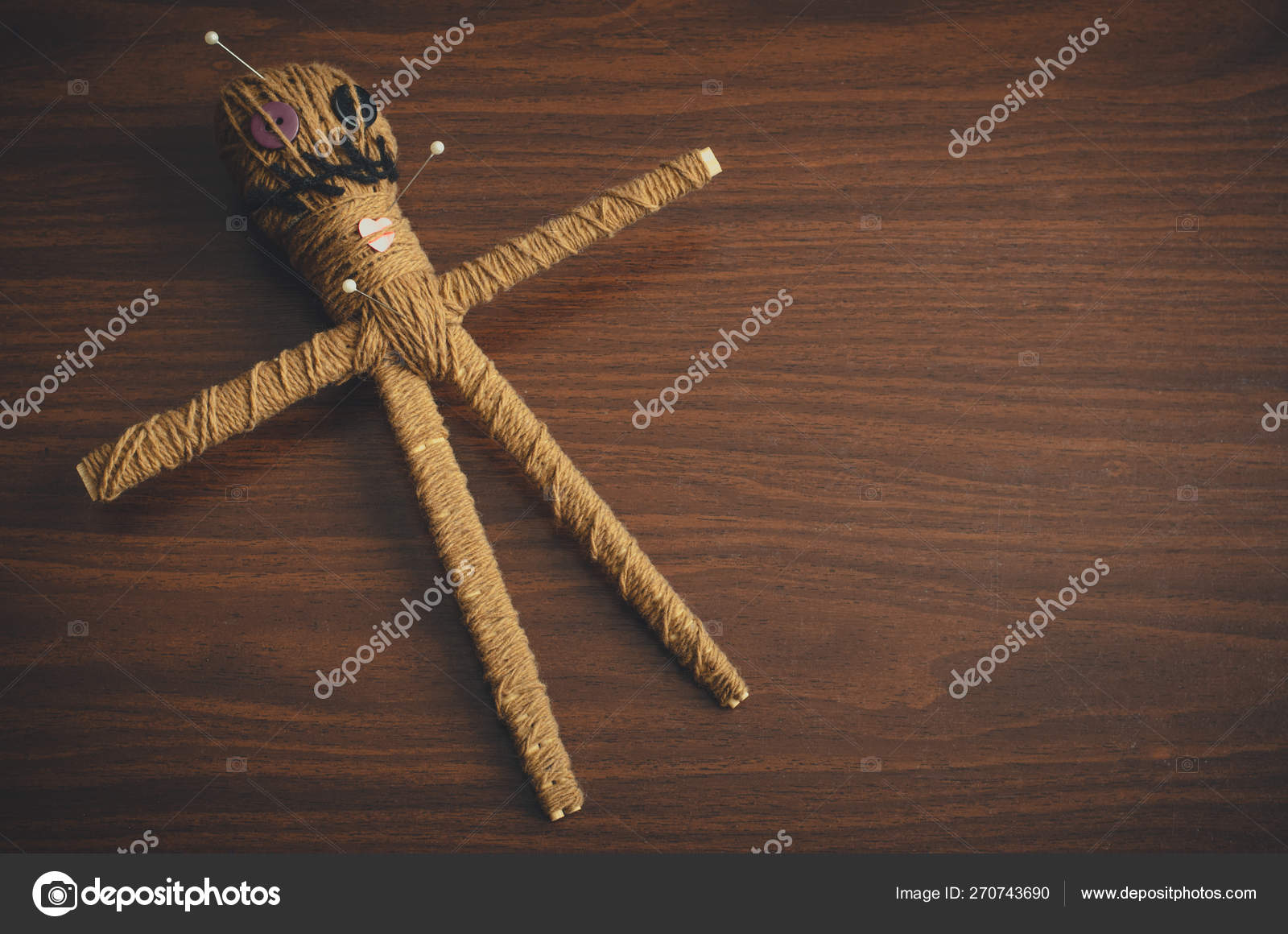 voodoo doll with needles