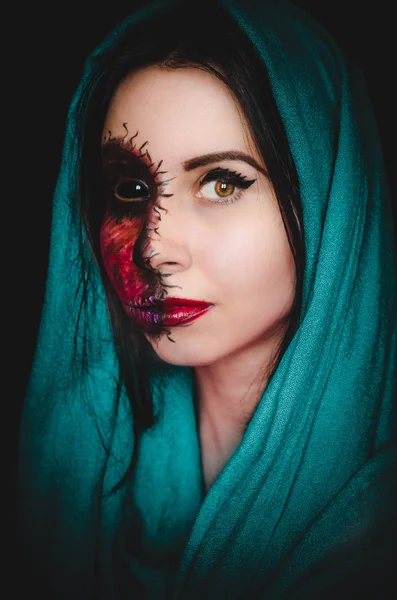 Portrait of a woman with a cursed mark on her face on dark background — Stock Photo, Image