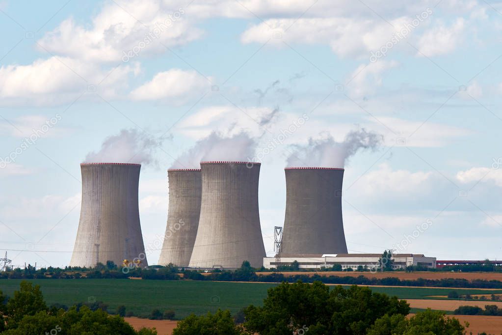 View of cooling chimneys of nuclear power plant. Landscape with 