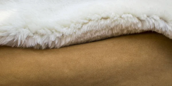 Orange and white fur and leather, textured fabric — Stock Photo, Image