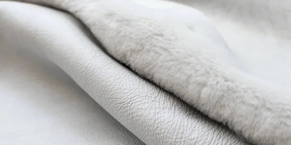 White fur background, rolled up, dented, natural fabric — Stock Photo, Image