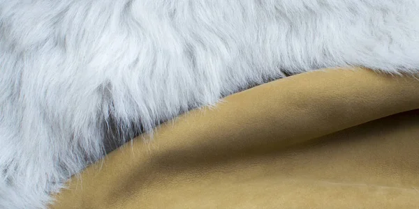 Orange and white fur and leather, textured fabric — Stock Photo, Image