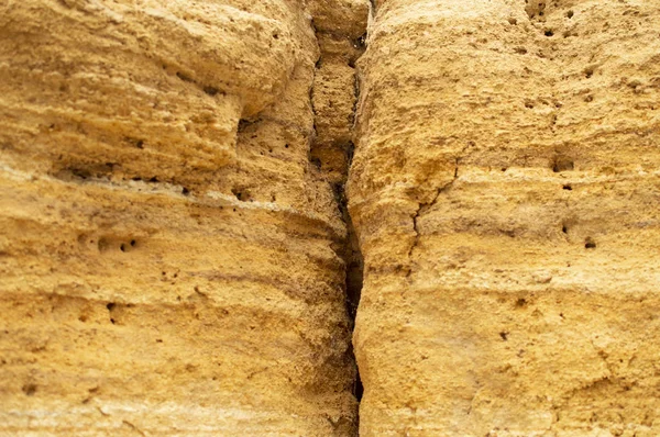 Arena naranja textura de roca, grieta en piedra — Foto de Stock