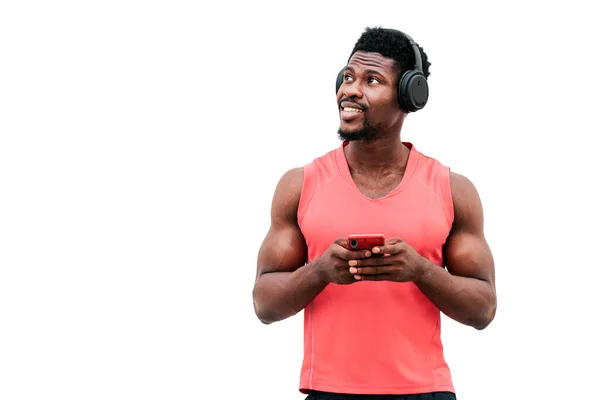 Афроамериканець Тримає Смартфон Слухає Музику Білому Ізольованому Фоні Чоловік Телефоном — стокове фото