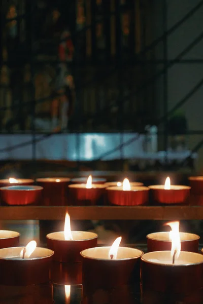 Candles in a church, light and fire