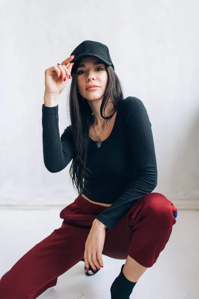 Portrait Brunette Girl Cap Sportswear Natural Light Red Sweatpants Black — Stock Photo, Image