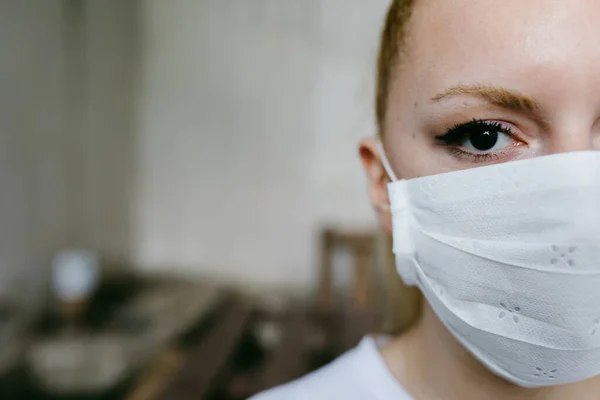 Young woman with face mask protection of Coronavirus.