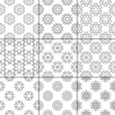 Gri ve beyaz çiçekli süsler. Kağıt için tarafsız Dikişsiz desen koleksiyonu Tekstil