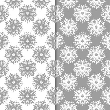 Beyaz ve gri çiçek süsler. Tekstil ve duvar kağıtları için sorunsuz arka planlar kümesi