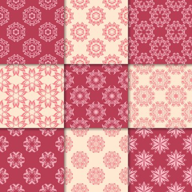 Kiraz kırmızı ve bej çiçekli süsler. Kağıt için dikişsiz desen koleksiyonu Tekstil