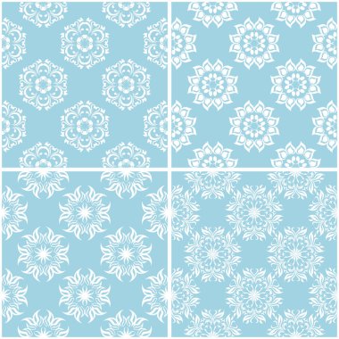 Çiçek desenleri. Mavi ve beyaz sorunsuz arka planlar kümesi. Vektör çizim